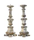 A Pair of Continental Painted and Parcel Gilt Pricket Sticks