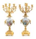 A Pair of Sevres Style Gilt Bronze Mounted Porcelain SixLight Candelabra