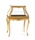 A Louis XVI Style Gilt Metal Mounted Vitrine