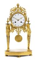 An Empire Gilt Bronze Mantel Clock