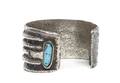 A Hopi Silver and Turquoise TufaCast Bracelet Charles Loloma
