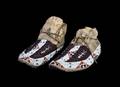 A Pair of Northern Plains Fully Beaded Moccasins