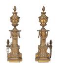 A Pair of Louis XVI Style Brass Chenets