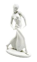 A White Ceramic Figure of a Woman