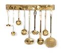 A Collection of Nine Brass Kitchen Utensils