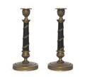 A Pair of Austrian Empire Style Gilt and Patinated Bronze Candlesticks