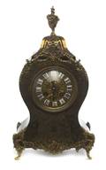 A Louis XV Style Mantel Clock