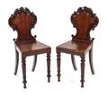 A Pair of Victorian Mahogany Hall Chairs