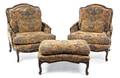 A Pair of Louis XV Style Walnut Bergeres
