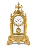 A Louis XVI Style Gilt Bronze Mantel Clock