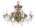 A Louis XV Style Brass EightLight Chandelier