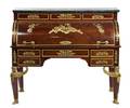 A French Empire Style Gilt Bronze Mounted Mahogany Bureau a Cylindre