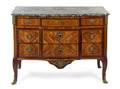 A Louis XVXVI Transitional Gilt Bronze Mounted Fruitwood Tulipwood and Mahogany Commode