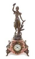 A French Cast Metal and Marble Figural Mantel Clock