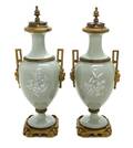 A Pair of Continental Gilt Bronze Mounted PatesurPate Urns and Covers
