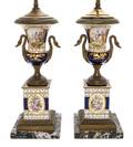 A Pair of Sevres Style Gilt Metal Mounted Porcelain Urns