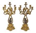 A Pair of Louis XV Style Gilt and Patinated Bronze SevenLight Candelabra