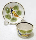 Miniature green spatter Leeds cup and saucer 19th c