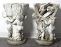 A Pair of Composition Garden Urns