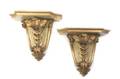 A Pair of Baroque Style Painted and Parcel Gilt Wall Brackets