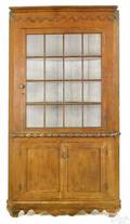 Pennsylvania painted cherry corner cupboard ca 1830