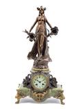An Art Nouveau Cast Metal and Onyx Figural Mantle Clock