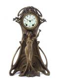 An American Cast Metal Art Nouveau Figural Clock