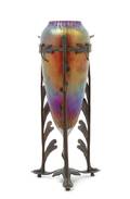 An Art Nouveau Style Iridescent Glass and Cast Metal Mounted Vase