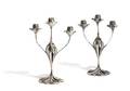 A Pair of French Art Nouveau Silvered Bronze ThreeLight Candelabra