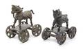 Pair of Antique Iron Horses on Wheels