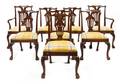 A Set of Eight George II Walnut Dining Chairs