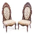A Pair of American Victorian Rosewood Slipper Chairs