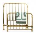 A Victorian Brass Bed and Quilt