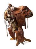 A Silver Gold and Tooled Brown Leather Western Saddle Set