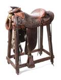 A Tooled Dark Brown Leather Western Saddle