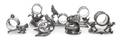 A Group of Seven SilverPlate Figural Napkin Rings with Birds