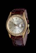 An 18 Karat Yellow Gold Ref 1501 Oyster Perpetual Date Wristwatch Rolex Circa 1960