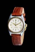 A Stainless Steel and 18 Karat Yellow Gold Oyster Perpetual Bubbleback Wristwatch Rolex Circa 1945
