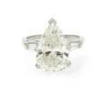 A Platinum and Pear Shape Diamond Ring