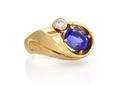A Yellow Gold Tanzanite and Diamond Ring