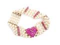 A 14 Karat Yellow Gold Cultured Pearl and Ruby Bracelet Tiffany  Co