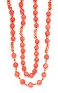 A Coral and Gold Tone Bead Necklace