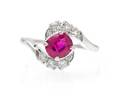 An 18 Karat White Gold Ruby and Diamond Ring