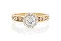 A 14 Karat Gold and Diamond Ring