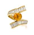 An 18 Karat Yellow Gold Yellow Sapphire and Diamond Ring