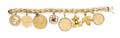 A 14 Karat Yellow Gold Charm Bracelet with Eight Attached Charms