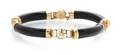 A 14 Karat Yellow Gold and Dyed Onyx Bracelet