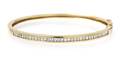 An 18 Karat Yellow Gold and Diamond Hinged Bangle Bracelet