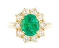 A Yellow Gold Emerald and Diamond Ring