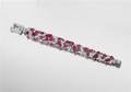 An Fine Art Deco Platinum Diamond and Carved Ruby Bracelet